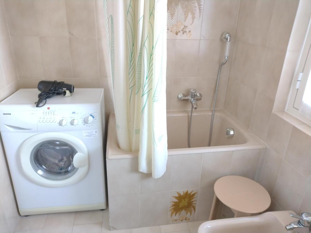 Casa Fronte Mare Apartment เวนติมิญา ภายนอก รูปภาพ